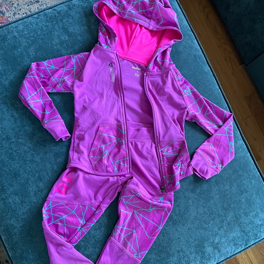 Reebok track suit.